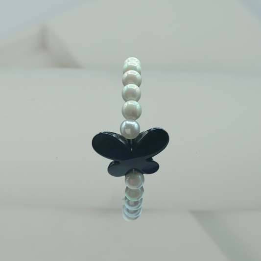 Pearl black butterfly charm bracelet