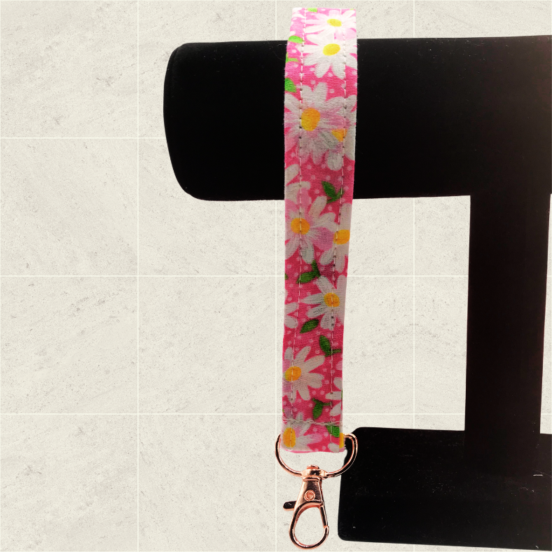 Pink daisy’s wristlet